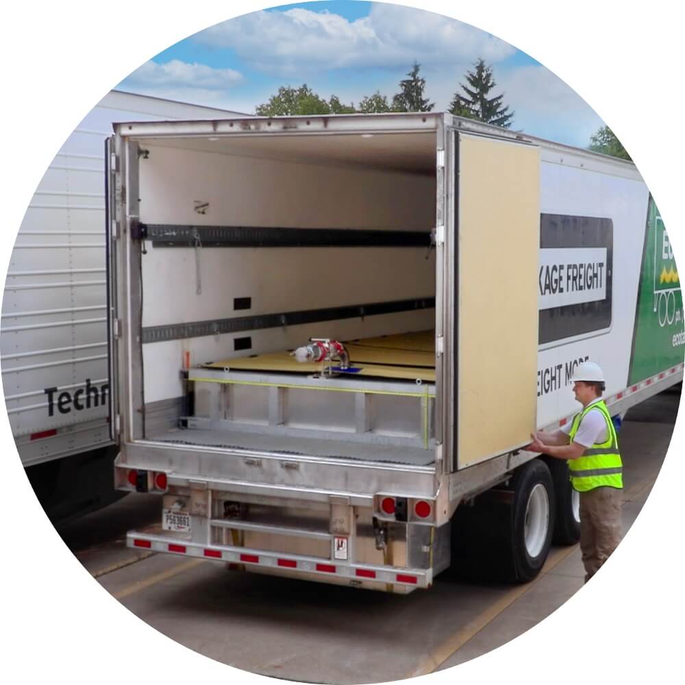 Image of a cargo trailer that contains the ECO-TankVan product in bulk liquid mode.